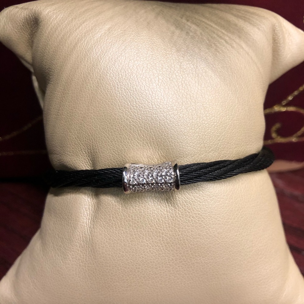 Charriol black cable and diamond bangle bracelet.